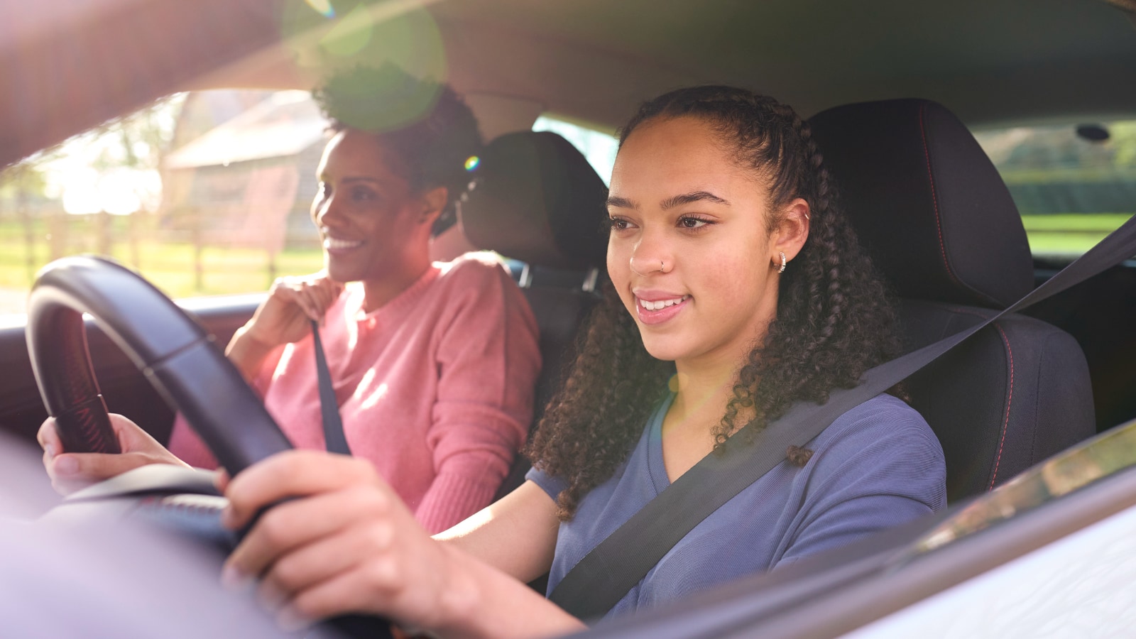 Teen female driver in car